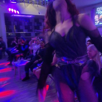 Luv SF - a woman dancing in a club - Dance Clubs Near Me - San Francisco, California