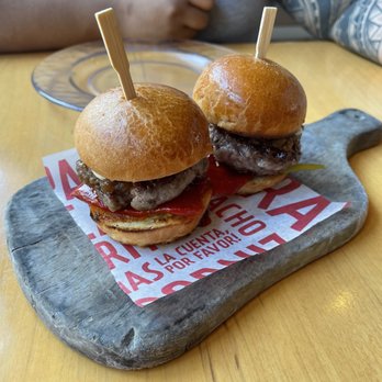 Jaleo - Pictured are their iberico sliders. I'm usually not a fan of red meat, but these melted in your mouth. Don't be fooled by their small size - Spanish Near Me - Washington, DC, District of Columbia