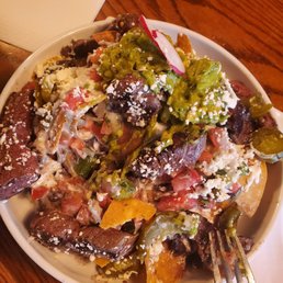 Steak nachos. Steak was cold so  I had to have them reheat the steak pieces.