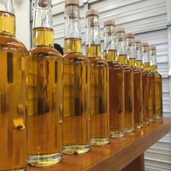 Elixir Inc - A row of Calisaya ready to be labeled. - Distilleries Near Me - Eugene, Oregon