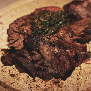 Kanoon - a close up of a steak on a wooden plate - Smokehouse Near Me - Clifton, New Jersey Kanoon - a close up of a steak on a wooden plate - Smokehouse Near Me - Clifton, New Jersey