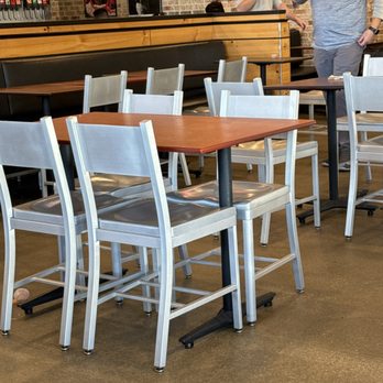Raising Cane's Chicken Fingers - Food left on other tables across dining room. - Fast Food Near Me - The Colony, Texas Raising Cane's Chicken Fingers - Food left on other tables across dining room. - Fast Food Near Me - The Colony, Texas