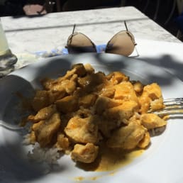 Rice with chicken and curry. Rice with chicken and curry.