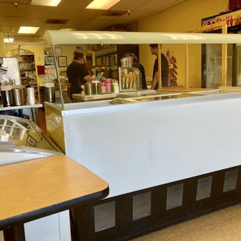 Del Valle Paleteria Y Neveria - Getting a mini banana split / Interior - Ice Cream & Frozen Yogurt Near Me - Gonzales, California Del Valle Paleteria Y Neveria - Getting a mini banana split / Interior - Ice Cream & Frozen Yogurt Near Me - Gonzales, California