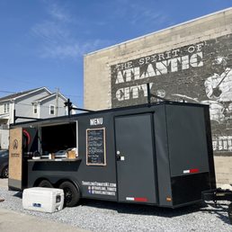 a food truck parked in front of a building