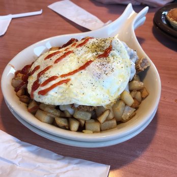 Village Inn - Country fried steak skillet. It was okay... the pancakes were good! - Breakfast & Brunch Near Me - Pace, Florida Village Inn - Country fried steak skillet. It was okay... the pancakes were good! - Breakfast & Brunch Near Me - Pace, Florida