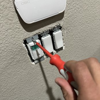 Spier Electric - Installing in wall time clock for customer - Electricians Near Me Spier Electric - Installing in wall time clock for customer - Electricians Near Me