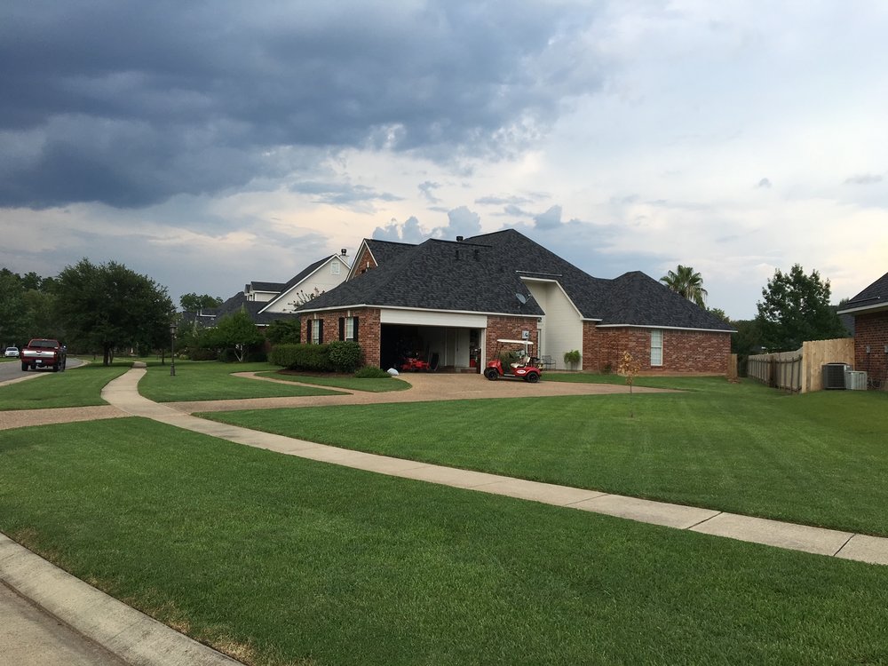 Slide of Triumph Roofing and Construction