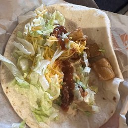 Soft taco with a couple pieces of potato. Not a potato soft taco..