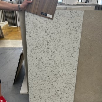 Beyond Flooring - a person standing in a store - Flooring Near Me - Los Angeles, California