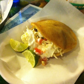 Flamingo's Mexican Restaurant - An authentic chalupa, stuffed with seasoned pork - Mexican Near Me - South Bend, Indiana