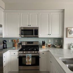 The cabinets previously were a dark brown.  The finished product is just what I was hoping for.  Light and Bright!!