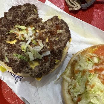 Griff's Hamburgers - You can see through the meat, my only complaint is that this is not a full patty. - Fast Food Near Me - Irving, Texas