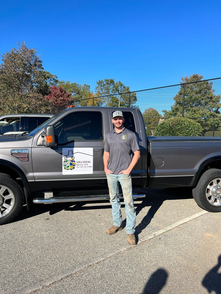 Slide of Noble Roofing