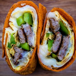 Santa Fe Wrap.
Cage, free eggs onions,pepper, patty sausages, mozzarella. mild salsa.