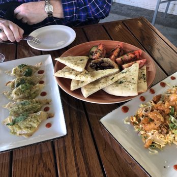 The Union Kitchen - Happy hour on the patio with dumplings, bang bang, shrimp, and hummus - New American Near Me - Houston, Texas The Union Kitchen - Happy hour on the patio with dumplings, bang bang, shrimp, and hummus - New American Near Me - Houston, Texas