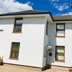 Omega Energy - External Wall Insulation with silicone render and brick render on a house in Newport