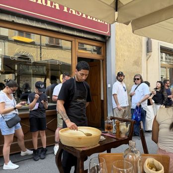 Osteria Pastella - A little show before the pasta descends into the creamy cheesy goodness. - Tuscan Near Me - Florence, FI Osteria Pastella - A little show before the pasta descends into the creamy cheesy goodness. - Tuscan Near Me - Florence, FI
