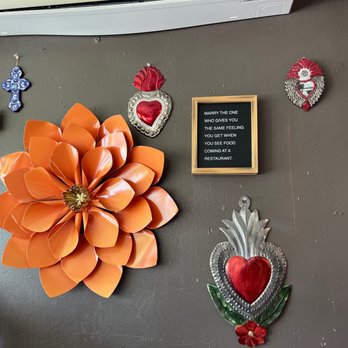 The Ocoee Taco Company - a picture of a door decorated with paper flowers - Mexican Near Me - Ocoee, Florida The Ocoee Taco Company - a picture of a door decorated with paper flowers - Mexican Near Me - Ocoee, Florida