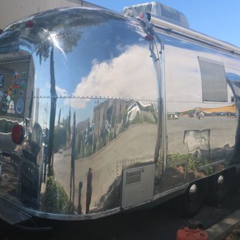 We Are Airstream - Photo of curb-side of trailer with replacement hatch installed. - RV Dealers Near Me - Ventura, California We Are Airstream - Photo of curb-side of trailer with replacement hatch installed. - RV Dealers Near Me - Ventura, California