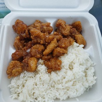 He's Kitchen - a container of rice and chicken - Chinese Near Me - Ocoee, Florida