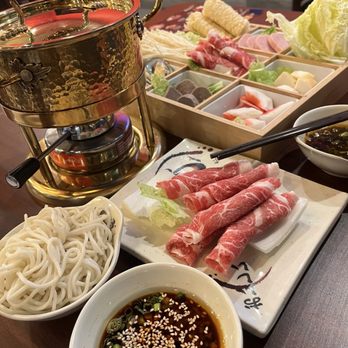 A tea A seat - A set with medium spicy broth and an extra side of beef chuck rolls. - Bubble Tea Near Me - Brentwood, California A tea A seat - A set with medium spicy broth and an extra side of beef chuck rolls. - Bubble Tea Near Me - Brentwood, California