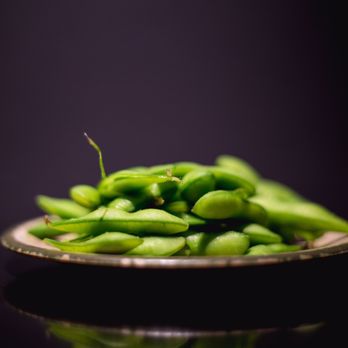 Sushi Too - An appitizer :Edamame. Nice look under the light, with black table top. - Sushi Bars Near Me - Pittsburgh, Pennsylvania Sushi Too - An appitizer :Edamame. Nice look under the light, with black table top. - Sushi Bars Near Me - Pittsburgh, Pennsylvania