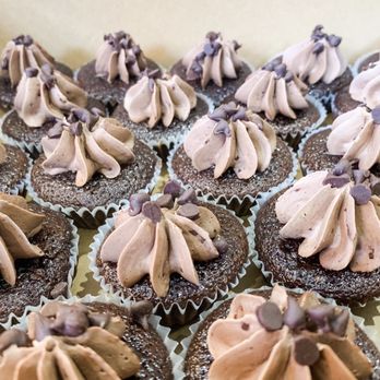 Terrapin Bakery - a tray of chocolate cupcakes with frosting - Donuts Near Me - Cleveland, Ohio