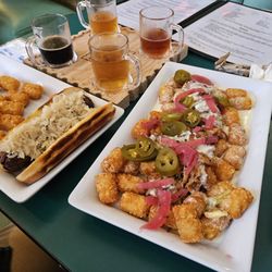 The Prost Office - Pulled pork tochos, brat, flight