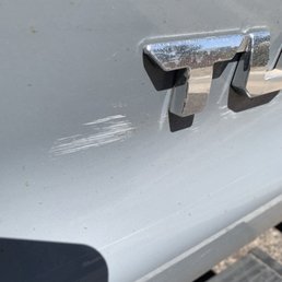 Either polish or paste wax left from detail