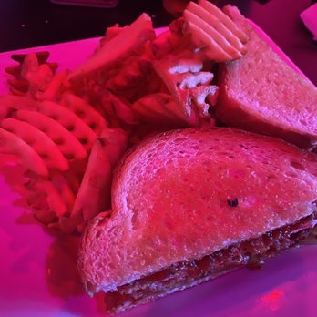 37 Main - a grilled sandwich and fries on a plate - Music Venues Near Me - Buford, Georgia