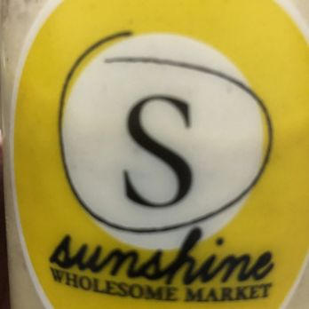 Sunshine Wholesome Market - a person holding a bottle - Health Markets Near Me - Toronto, Ontario Sunshine Wholesome Market - a person holding a bottle - Health Markets Near Me - Toronto, Ontario
