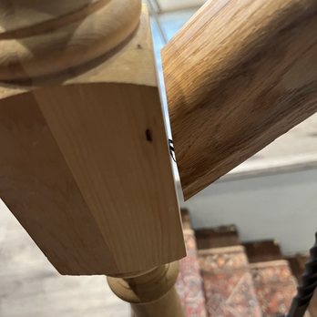 Sealion Construction - a close up view of a wooden handrail - General Contractors Near Me