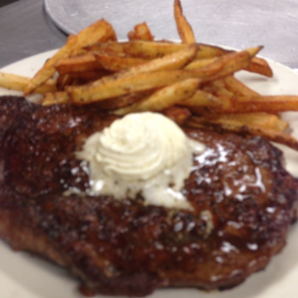 The Compass - 16 oz ribeye with French fries - Pizza Near Me - McAlester, Oklahoma