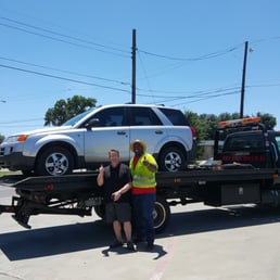 James, our friendly tow driver and my husband. Making the best of the situation!