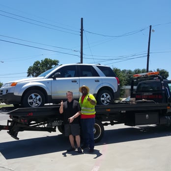 Dallas Discount Towing - James, our friendly tow driver and my husband. Making the best of the situation! - Towing Near Me - Dallas, Texas