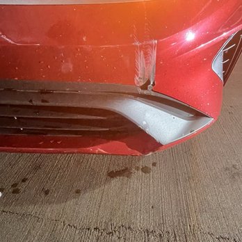 Avis - Avis - Huge hole and scraped damage to front bumper - Car Rental Near Me - Hanover, Maryland