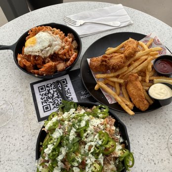 Ballast Point Brewing Long Beach - Sweet potato fries with pork belly and egg, Nachos, Fish and chips - Breweries Near Me - Long Beach, California