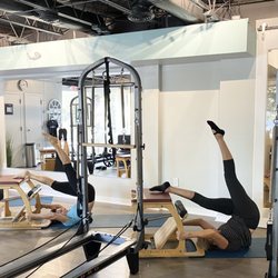 Epic Pilates Studio - Pilates Exo Chair Control Balance exercise. Epic Pilates Stduio.