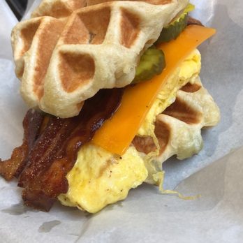 Wake Up And Waffle - Garlic waffle with cheddar bacon and eggs - Breakfast & Brunch Near Me - Sandusky, Ohio Wake Up And Waffle - Garlic waffle with cheddar bacon and eggs - Breakfast & Brunch Near Me - Sandusky, Ohio