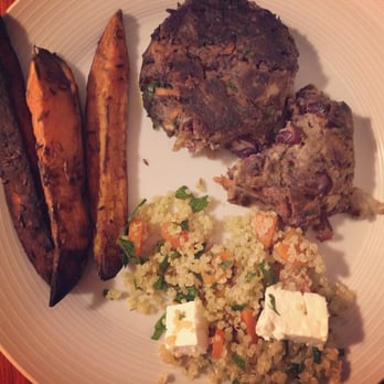 The Yoga Kitchen - Black bean and mushroom burgers, spiced sweet potato fries and quinoa, carrot and mint salad with feta. - Food Delivery Services Near Me