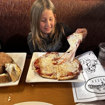 Skipolini's Pizza & Pasta - Look at that cheese pull - Pizza Near Me - Folsom, California Skipolini's Pizza & Pasta - Look at that cheese pull - Pizza Near Me - Folsom, California