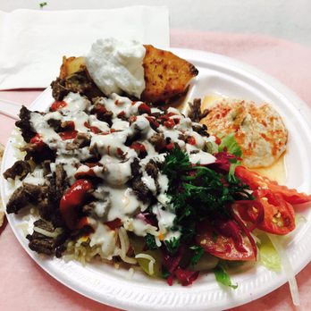 Shawarma Knight - Lamb platter. The best platter I've EVER had. Hummus is smooth, garlic+potatoes are amazing, meat+sauces are SO good. - Middle Eastern Near Me - Calgary, Alberta