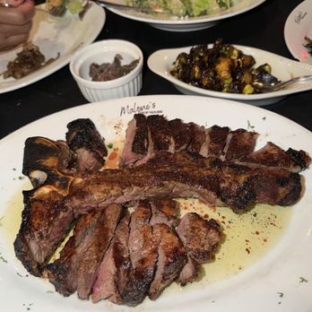 Malone's Chop House - Porterhouse steak, caesar salad, anchovies, hot honey brussels - Steakhouses Near Me - Brooklyn, New York