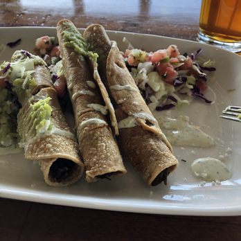 Wonderland Ocean Pub - Short rib rolled tacos - New American Near Me - San Diego, California Wonderland Ocean Pub - Short rib rolled tacos - New American Near Me - San Diego, California