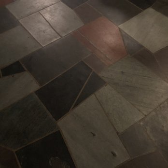 Boozgeois Saloon - a tiled floor in a restaurant - Dive Bars Near Me - Fort Pierce, Florida