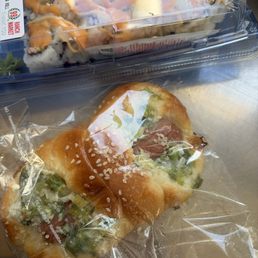 Hot dog bun and California rolls