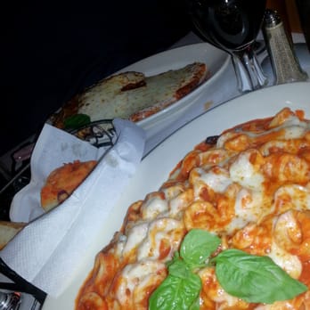 Cafe Baci - Calamari fra diavlo, topped with melted mozzarella, so good! - Italian Near Me - Westbury, New York Cafe Baci - Calamari fra diavlo, topped with melted mozzarella, so good! - Italian Near Me - Westbury, New York