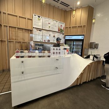 Pressed Juicery - a curved counter in a coffee shop - Juice Bars & Smoothies Near Me - San Jose, California Pressed Juicery - a curved counter in a coffee shop - Juice Bars & Smoothies Near Me - San Jose, California