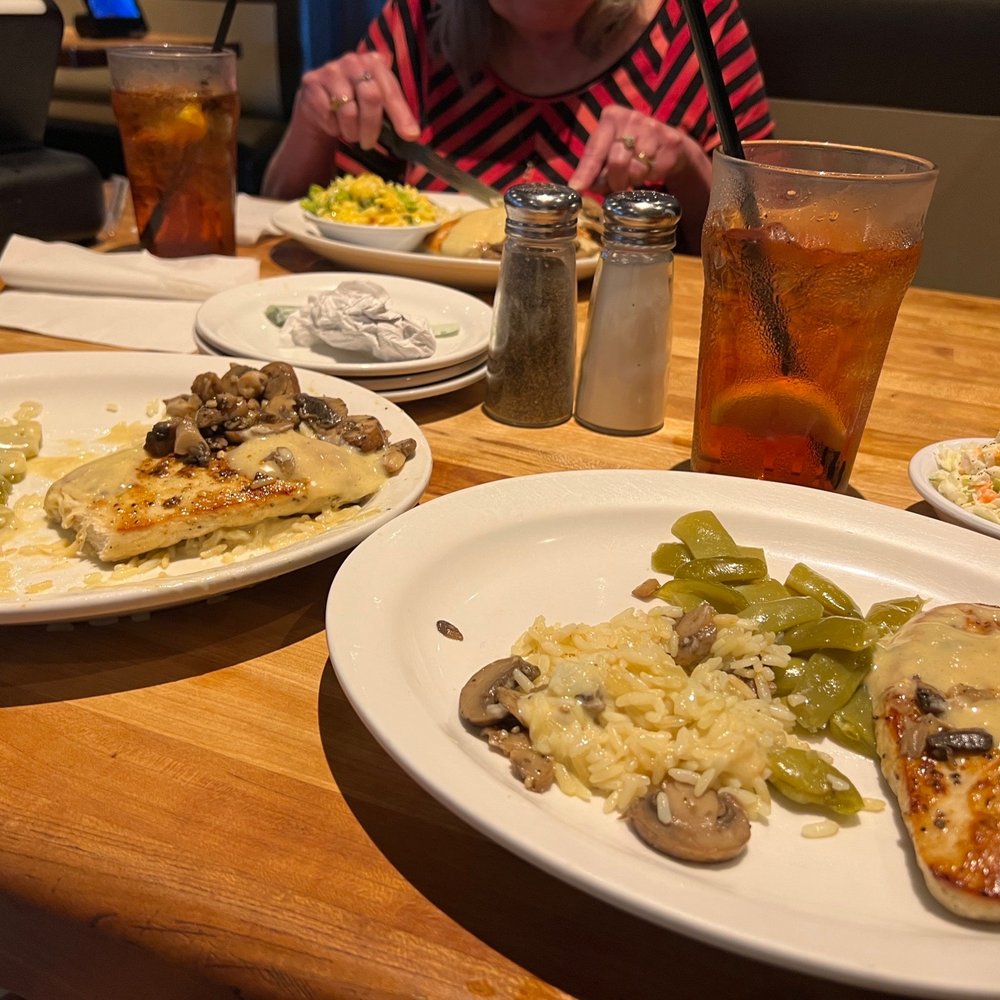 Cheddar's Scratch Kitchen - Both plates with the Dijon Chicken & Mushrooms and sides. Our friend ordered it too but with extra rice and broccoli casserole. - Comfort Food Near Me - Albany, Georgia Cheddar's Scratch Kitchen - Both plates with the Dijon Chicken & Mushrooms and sides. Our friend ordered it too but with extra rice and broccoli casserole. - Comfort Food Near Me - Albany, Georgia